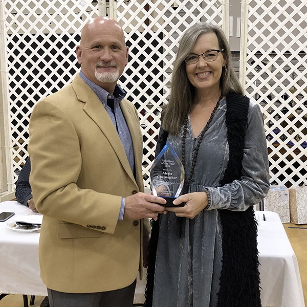 Alesia Christopher was presented with the Volunteer of the Year Award for her hard work and dedication with The Red Barn.