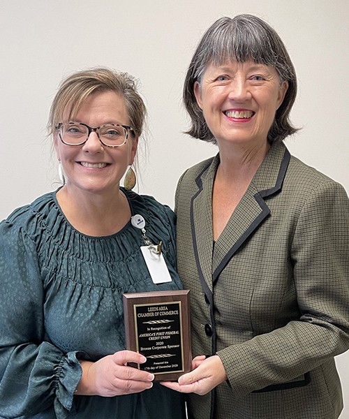 Leeds 2020 Bronze Sponsor America's First Federal Credit Union plaque presented to Amy Snow by Outgoing Chamber President Dona