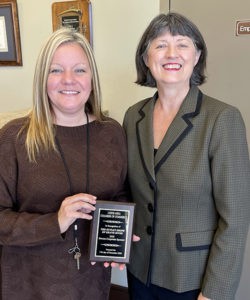 Leeds 2020 Bronze Sponsor The Outlet Shops of Grand River plaque presented to Jeannie Cole by Outgoing Chamber President Dona Bonnett