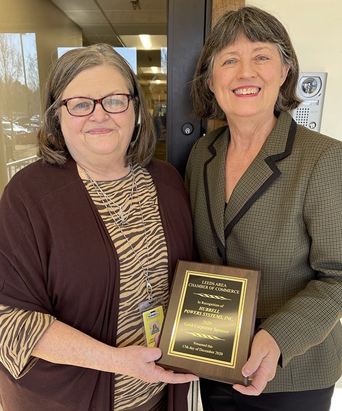 Hubbell Power Systems, Inc. 2020 Gold Sponsor Plaque presented to Debbie Oden by Outgoing President Dona Bonnett