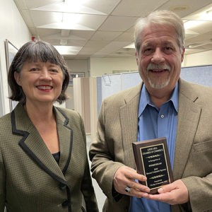 Leeds 2020 Bronze Sponsor Windstream plaque presented to Gary Dunlap by Outgoing Chamber President Dona Bonnett