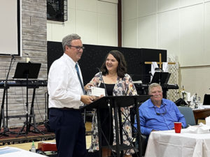 Leeds Area Chamber of Commerce chose Mary Beth Lochridge as the 2022 Teacher of the Year.  Leeds City Schools Superintendent, John Moore,