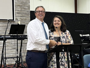 Leeds Area Chamber of Commerce chose Mary Beth Lochridge as the 2022 Teacher of the Year.  Leeds City Schools Superintendent, John Moore,