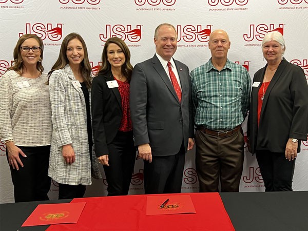 Leeds Area Chamber JSU Signing Event Photo L-R: Jessica Wiggins, Kelly Martin, Dr. Emily Messer, President Don Killingsworth, Jr., Mike Cauble - Leeds Redevelopment Authority, Sandra McGuire - Leeds Area Chamber.